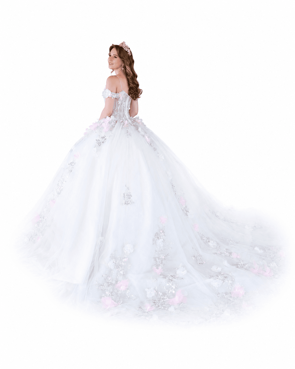 Quinceanera posing in a regal white dress in our boutique studio